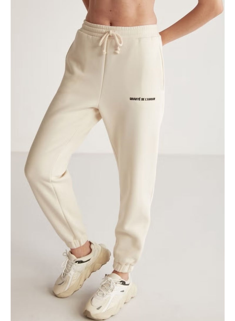 GRIMELANGE Carroline Women's Casual Cut Embroidered Waist and Leg Elastic Vanilla Sweatpants - Image 1